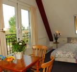 kamer met uitzicht over de weilanden kamer met uitzicht over de weilanden
